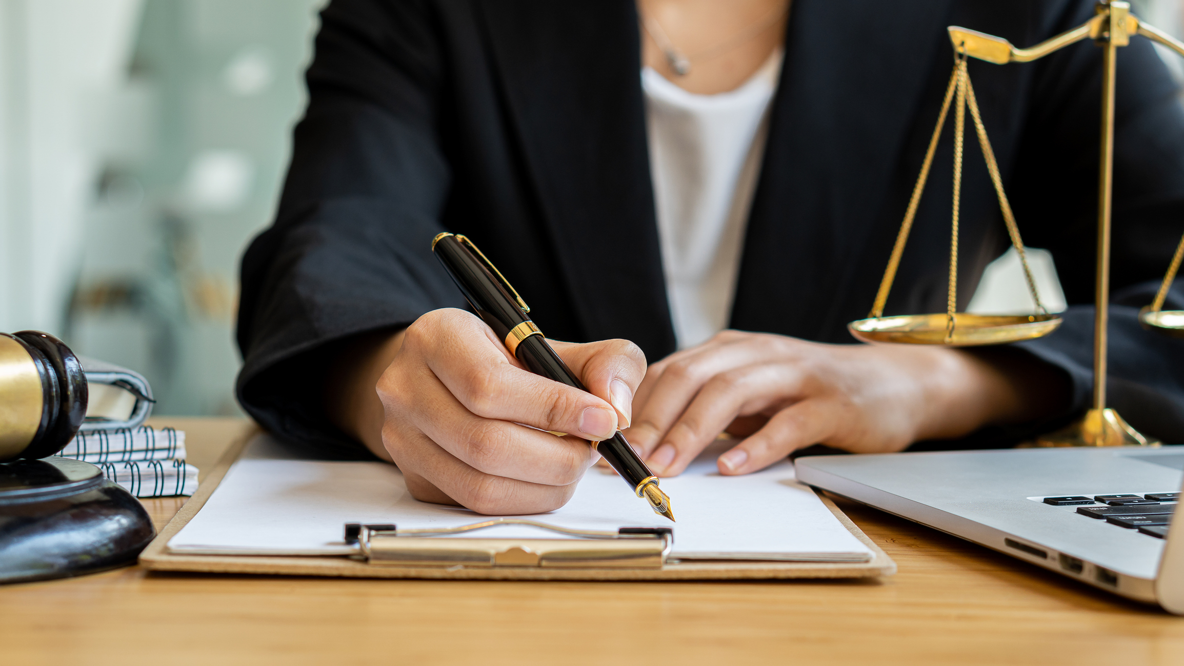 Lawyer Consulting Businessman In Office With Judge Hammer And Justice Scales With Laptop, Attorney Concept And Legal Consulting.