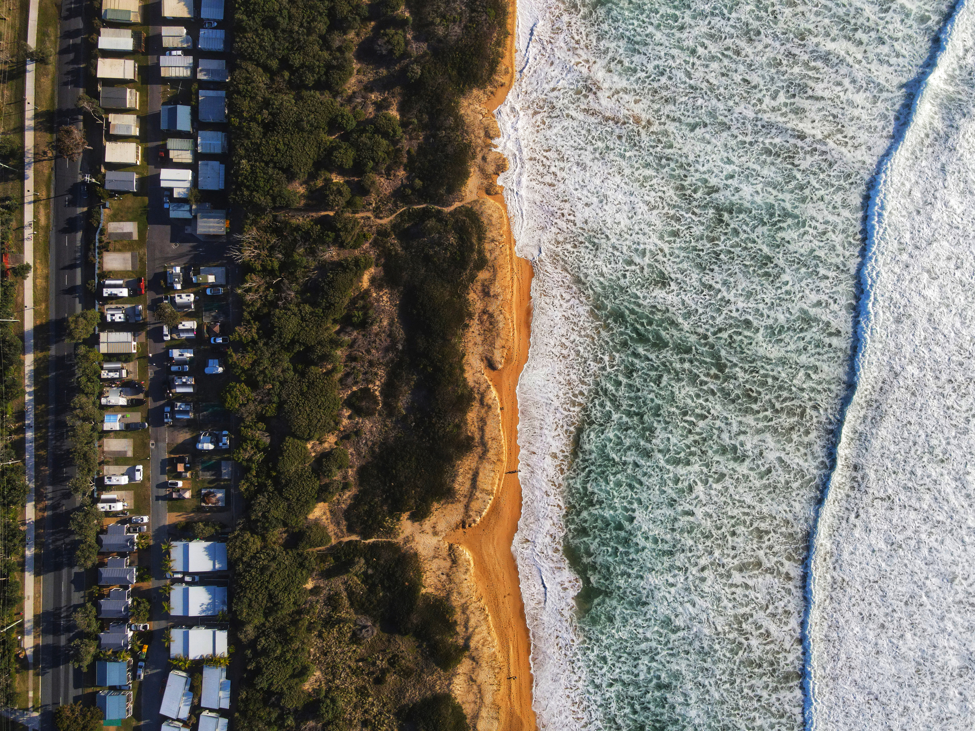 A Big Swell With Large Waves In Tathra, Nsw. Pictured Here, Tathra Wharf And Kianinny Bay. Huge Waves And Dangerous Swell.