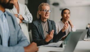 Diverse Group Of Professionals In A Business Meeting At Bright Office